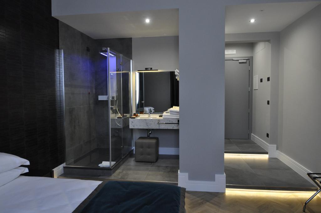 Place 24 Suites & Wellness روما الغرفة الصورة