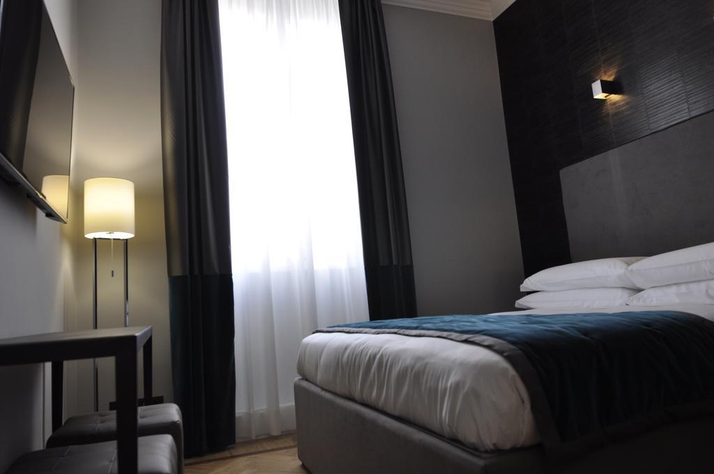 Place 24 Suites & Wellness روما الغرفة الصورة